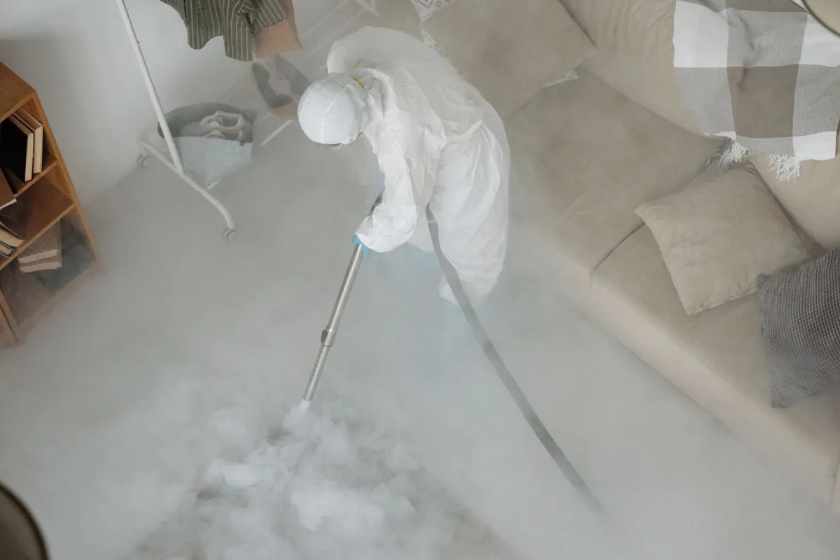 Biohazard cleanup technician in protective equipment, Big Flats, NY